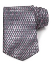Featuring a witty necktie pattern, this handsome tie offers the height of luxury in plush Italian silk.