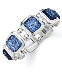 Blue stones add a bold touch to this stretch bracelet from Charter Club. Crafted from silver-tone mixed metal, the bracelet makes a strong fashion choice for any affair. Item comes packaged in a signature Charter Club box. Approximate diameter: 2-1/4 inches.
