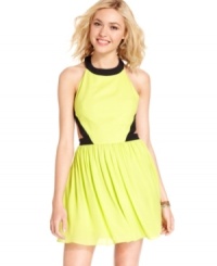 Dark trims pop against the nuclear-bright hue on this fun halter dress from Rampage! Featuring a swingy, a-line skirt and chic side cutouts, this frock adds brilliant style to your stock of summer togs! Dark trims pop against the nuclear-bright hue on this fun halter dress from Rampage! Featuring a swingy, a-line skirt and chic side cutouts, this frock adds brilliant style to your stock of summer togs!