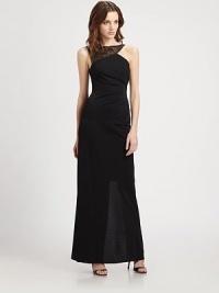 A shimmering sequined yoke and asymmetrical pleats lend allure to this floor-length silhouette.Modified boatneckSequined yokeSleevelessSide pleatingBack slitAsymmetrical back zipAbout 46 from natural waistPolyesterDry cleanImportedModel shown is 5'10 (177cm) wearing US size Small. A shimmering sequined yoke and asymmetrical pleats lend allure to this floor-length silhouette.Modified boatneckSequined yokeSleevelessSide pleatingBack slitAsymmetrical back zipAbout 46 from natural waistPolyesterDry cleanImportedModel shown is 5'10 (177cm) wearing US size Small.
