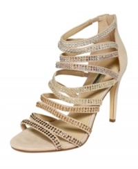 Thin rhinestone-accented straps make INC International Concepts' Ricci sandals a sparkly and dressy addition to your shoe wardrobe. Thin rhinestone-accented straps make INC International Concepts' Ricci sandals a sparkly and dressy addition to your shoe wardrobe.