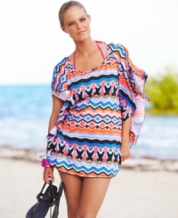 Go from the sand to the streets in this chic printed tunic from Kenneth Cole Reaction! Go from the sand to the streets in this chic printed tunic from Kenneth Cole Reaction!
