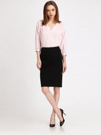 High-waisted pencil silhouette of stretch twill, with a back adjustable slit for added versatility. Slim silhouetteHigh-rise waistVertical seamBack slit at hemBack zip/hook-and-bar closureBack zipper at hemAbout 22 from natural waist71% viscose/23% polyamide/6% elastaneDry cleanImportedModel shown is 5'9 (175cm) wearing US size 4. High-waisted pencil silhouette of stretch twill, with a back adjustable slit for added versatility. Slim silhouetteHigh-rise waistVertical seamBack slit at hemBack zip/hook-and-bar closureBack zipper at hemAbout 22 from natural waist71% viscose/23% polyamide/6% elastaneDry cleanImportedModel shown is 5'9 (175cm) wearing US size 4.