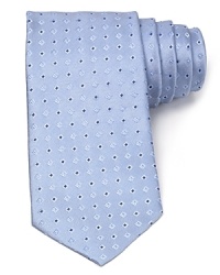 An opulent tie in lavish Italian silk features an allover diamond design in a classic width. An opulent tie in lavish Italian silk features an allover diamond design in a classic width.