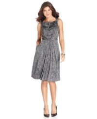 Jones New York's petite dress features a flattering retro shape with a beautiful print and dainty pleats. Wear with your favorite pumps for a complete look. Jones New York's petite dress features a flattering retro shape with a beautiful print and dainty pleats. Wear with your favorite pumps for a complete look.