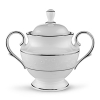 With enameled pearl-like dots, an opalescent background, and the innocence of bone china, Opal Innocence is a romantic pattern of understated elegance. Two bands of platinum a slightly wider one on the rim, kissing a thin fluted design, and a narrower one inside the border adorn each plate. The cup bears additional platinum on its graceful handle and another band at midpoint. Each piece is decorated with a flowing, white-on-white vine design peppered with enamel dots. This service creates a splendid formal table setting and, because of its neutral coloring, works well with any table décor. With enameled pearl-like dots, an opalescent background, and the innocence of bone china, Opal Innocence is a romantic pattern of understated elegance. Two bands of platinum a slightly wider one on the rim, kissing a thin fluted design, and a narrower one inside the border adorn each plate. The cup bears additional platinum on its graceful handle and another band at midpoint. Each piece is decorated with a flowing, white-on-white vine design peppered with enamel dots. This service creates a splendid formal table setting and, because of its neutral coloring, works well with any table décor.