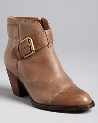 These Corso Como suede booties are polished enough for office causal looks, with golden buckle accents, but manage to keep things trendy enough for your down time, with a whisper of Western appeal. These Corso Como suede booties are polished enough for office causal looks, with golden buckle accents, but manage to keep things trendy enough for your down time, with a whisper of Western appeal.