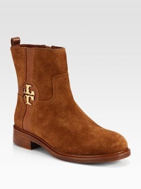 Suede and pebbled leather combine in this short silhouette with a goldtone logo-detail and easy side zip. Stacked heel, 1¼ (30mm)Suede upper with leather trimSize zipLeather liningRubber solePadded insoleImported Suede and pebbled leather combine in this short silhouette with a goldtone logo-detail and easy side zip. Stacked heel, 1¼ (30mm)Suede upper with leather trimSize zipLeather liningRubber solePadded insoleImported