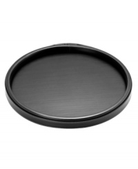 A rich pebbled texture gives this handsome black collection of Kraftware serving trays the look and feel of real leather. With contrast stitching and a raised edge to prevent martinis and snack mix from toppling over. A rich pebbled texture gives this handsome black collection of Kraftware serving trays the look and feel of real leather. With contrast stitching and a raised edge to prevent martinis and snack mix from toppling over.
