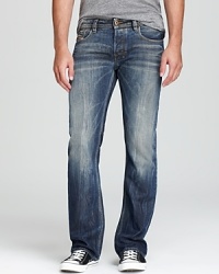 Comfortably cool, these 5-pocket jeans are updated with fading on the knees and thighs and a trendy bootcut. Comfortably cool, these 5-pocket jeans are updated with fading on the knees and thighs and a trendy bootcut.
