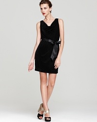 Striped velvet lends a textured look to Aqua's sleeveless dress, chic yet comfortable with an elasticized waist. Striped velvet lends a textured look to Aqua's sleeveless dress, chic yet comfortable with an elasticized waist.