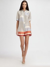 The ultimate in casual elegance: striped panels of supple silk, tailored in a boxy, menswear-inspired design.Point collarButton frontShort sleeves with adjustable button cuffsInverted back pleatAbout 26 from shoulder to hemSilkDry cleanMade in Italy of imported fabricModel shown is 5'11 (180cm) wearing US size 4. The ultimate in casual elegance: striped panels of supple silk, tailored in a boxy, menswear-inspired design.Point collarButton frontShort sleeves with adjustable button cuffsInverted back pleatAbout 26 from shoulder to hemSilkDry cleanMade in Italy of imported fabricModel shown is 5'11 (180cm) wearing US size 4.