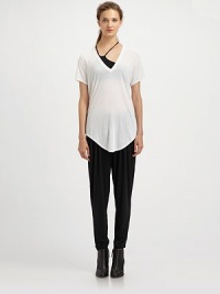 From the HELMUT capsule collection. Seriously soft jersey pants in a trend-forward harem silhouette with a comfortable elastic waistband and slightly cropped fit. Elastic waistbandRise, about 9Inseam, about 25Modal/wool/spandexDry cleanImportedModel shown is 5'9 (176cm) wearing US size Small. From the HELMUT capsule collection. Seriously soft jersey pants in a trend-forward harem silhouette with a comfortable elastic waistband and slightly cropped fit. Elastic waistbandRise, about 9Inseam, about 25Modal/wool/spandexDry cleanImportedModel shown is 5'9 (176cm) wearing US size Small.