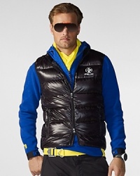 Perfect for any athletic expedition, this water-repellent nylon vest offers an incredibly airy and lightweight feel thanks to its supremely plush down filling. Perfect for any athletic expedition, this water-repellent nylon vest offers an incredibly airy and lightweight feel thanks to its supremely plush down filling.