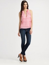 Favorably feminine top of pure silk with a pleated, tiered front and modified racerback. Split roundneck with self tiesSleevelessModified racerbackSilkDry cleanImportedModel shown is 5'10 (177cm) wearing US size 2. Favorably feminine top of pure silk with a pleated, tiered front and modified racerback. Split roundneck with self tiesSleevelessModified racerbackSilkDry cleanImportedModel shown is 5'10 (177cm) wearing US size 2.