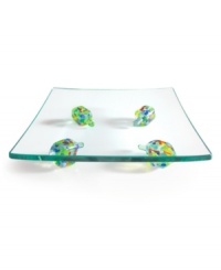 This colorful dreidel dish is a festive host for Hanukkah favorites, from crispy latkes to chocolate gelt, and an easy way to extend cheer well beyond the holiday. Four vibrant tops separate a slate of thick glass from your dinner or coffee table. This colorful dreidel dish is a festive host for Hanukkah favorites, from crispy latkes to chocolate gelt, and an easy way to extend cheer well beyond the holiday. Four vibrant tops separate a slate of thick glass from your dinner or coffee table.