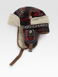 A winter essential, this trapper hat is crafted in a bold check pattern with signature horseshoe detail and trimmed with plush faux fur for long-lasting warmth.50% wool/50% polyesterDry cleanImported A winter essential, this trapper hat is crafted in a bold check pattern with signature horseshoe detail and trimmed with plush faux fur for long-lasting warmth.50% wool/50% polyesterDry cleanImported