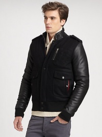 Collegiate-inspired style with an extra dose of attitude, crafted in a rich cotton blend with great attention to detail and sleek leather sleeves for an authentic finishing touch.Zip frontSnap button placketStand collarBanded cuffs and hemZippered chest, waist flap pocketsAbout 27 from shoulder to hem56% cotton/25% polyester/19% polyurethane/Dry cleanImported Collegiate-inspired style with an extra dose of attitude, crafted in a rich cotton blend with great attention to detail and sleek leather sleeves for an authentic finishing touch.Zip frontSnap button placketStand collarBanded cuffs and hemZippered chest, waist flap pocketsAbout 27 from shoulder to hem56% cotton/25% polyester/19% polyurethane/Dry cleanImported