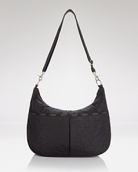 LeSportsac encapsulates effortless accessorizing. This simply styled nylon baby bag works the brand's signature aesthetic with multiple pockets, an interior changing pad, and perfectly proportioned shape. LeSportsac encapsulates effortless accessorizing. This simply styled nylon baby bag works the brand's signature aesthetic with multiple pockets, an interior changing pad, and perfectly proportioned shape.