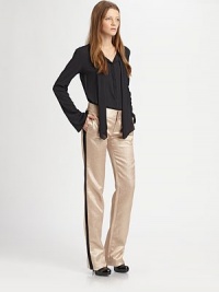 Shimmering jacquard pants invigorated by contrasting side panels and voluminous wide-leg construction. Button closureZip flyBack besom pocketsRise, about 8½Inseam, about 3745% silk/30% metallic fibers/25% cottonDry cleanMade in USA of imported fabricModel shown is 5'7 (174cm) wearing US size 2.