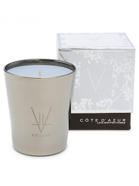 Cote D'Azur Bougie Luxe Large Candle blends white lily, water hyacinth and white freesia with pink rose and French verbena. Created to inspire and soothe the soul, these candles are derived from all-natural beeswax. Each skillfully blends unique botanical wax with the most seductive fine fragrance oils from around the world. Experience Vie Luxe and escape to the place of your dreams. 60-hour burn time. 8.0 oz. 