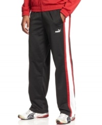 Kick up your comfort and prepare for a good performance with these sporty track pants from Puma. Kick up your comfort and prepare for a good performance with these sporty track pants from Puma.