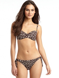THE LOOKAllover leopard printPadded, underwire cupsAdjustable strapsBack claspTHE MATERIAL80% nylon/20% spandexFully linedCARE & ORIGINHand washMade in USAPlease note: Bikini bottom sold separately. THE LOOKAllover leopard printPadded, underwire cupsAdjustable strapsBack claspTHE MATERIAL80% nylon/20% spandexFully linedCARE & ORIGINHand washMade in USAPlease note: Bikini bottom sold separately.