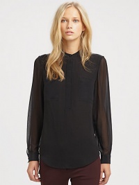 A sheer back and hi-lo hem lend a modern edge to this elegant, silky design. Banded round necklineLong button cuff sheer sleevesConcealed front button placketHi-lo hemSheer back panelAbout 29 from shoulder to hemSilkDry cleanImportedModel shown is 5'10 (177cm) wearing US size 4. A sheer back and hi-lo hem lend a modern edge to this elegant, silky design. Banded round necklineLong button cuff sheer sleevesConcealed front button placketHi-lo hemSheer back panelAbout 29 from shoulder to hemSilkDry cleanImportedModel shown is 5'10 (177cm) wearing US size 4.