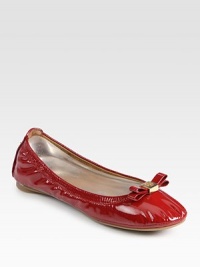High-gloss patent leather flat has a stretchy upper and logoed bow adornment. Patent leather upperLeather liningRubber solePadded insoleImportedOUR FIT MODEL RECOMMENDS ordering true size. High-gloss patent leather flat has a stretchy upper and logoed bow adornment. Patent leather upperLeather liningRubber solePadded insoleImportedOUR FIT MODEL RECOMMENDS ordering true size.