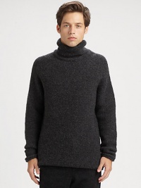 A soft jersey wool blend shapes a classic, versatile wardrobe staple for those approaching wintry days and nights.Turtleneck80% mercerized wool/20% nylonDry cleanImported A soft jersey wool blend shapes a classic, versatile wardrobe staple for those approaching wintry days and nights.Turtleneck80% mercerized wool/20% nylonDry cleanImported