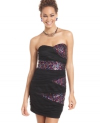 Teeze Me's alluring dress feels festive with bandage styling and confetti-colored sequins! Teeze Me's alluring dress feels festive with bandage styling and confetti-colored sequins!
