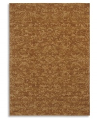 Crafted to impart a vintage wear and lush visual texture, this Karastan rug features subtle fabric-like patterning inspired by the organic designs found in granite and marble. Machine woven from 100% wool in a hushed curry-orange hue. Crafted to impart a vintage wear and lush visual texture, this Karastan rug features subtle fabric-like patterning inspired by the organic designs found in granite and marble. Machine woven from 100% wool in a hushed curry-orange hue.