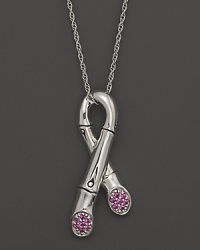 Sterling silver, joined like a bamboo stalk, forms a ribbon pendant with sparkling pink sapphire pavé at the ends. On an adjustable chain. Sterling silver, joined like a bamboo stalk, forms a ribbon pendant with sparkling pink sapphire pavé at the ends. On an adjustable chain.