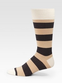 Bold stripes add color and warmth underfoot.Mid-calf heightRibbed cuff72% cotton/26% nylon/2% spandexMachine washImported Bold stripes add color and warmth underfoot.Mid-calf heightRibbed cuff72% cotton/26% nylon/2% spandexMachine washImported