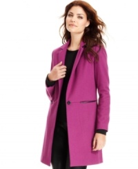 DKNYC's coat features sleek single-button styling and faux leather-trimmed pockets for fashion-forward finishing touch. DKNYC's coat features sleek single-button styling and faux leather-trimmed pockets for fashion-forward finishing touch.