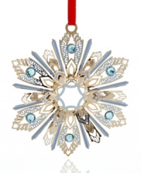 Ice-blue accents and a radiant silver shine give ChemArt's Jeweled Snowflake ornament a look of timeless holiday splendor. Ice-blue accents and a radiant silver shine give ChemArt's Jeweled Snowflake ornament a look of timeless holiday splendor.