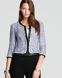 Blending urban edge with uptown polish, this Lafayette 148 New York jacket shakes up classic tweed with slim tailoring and statement leather trim.