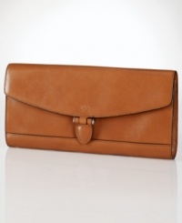 Effortless for evening, this classic clutch from Laruen Ralph Lauren is an elegant addition to any ensemble. Crafted from smooth leather with signature detailing, an essential mirror is discretely hidden under the front flap. Effortless for evening, this classic clutch from Laruen Ralph Lauren is an elegant addition to any ensemble. Crafted from smooth leather with signature detailing, an essential mirror is discretely hidden under the front flap.