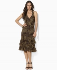 Rendered in a flattering wrap silhouette, Lauren by Ralph Lauren's flowing silk georgette dress is finished with delicate ruffles. Rendered in a flattering wrap silhouette, Lauren by Ralph Lauren's flowing silk georgette dress is finished with delicate ruffles.