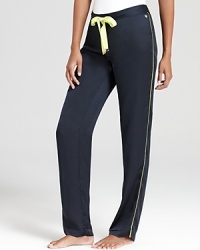 Juicy Couture adds an electric touch to its tumbled satin sleep pants with a neon ribbon drawstring. Juicy Couture adds an electric touch to its tumbled satin sleep pants with a neon ribbon drawstring.