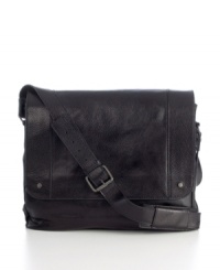 Follow your first impression-this messenger bag is a standout in both style and function, offering a rich creamy leather exterior that draws you in to reveal its roomy double compartments, simplistic flap-over design and convenient organizer pockets, putting practicality at fashion's doorstep. Limited lifetime warranty. Follow your first impression-this messenger bag is a standout in both style and function, offering a rich creamy leather exterior that draws you in to reveal its roomy double compartments, simplistic flap-over design and convenient organizer pockets, putting practicality at fashion's doorstep. Limited lifetime warranty.