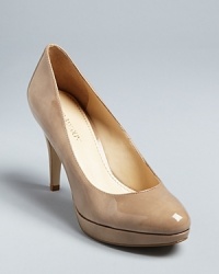 Glossy and lustrous, Enzo Angiolini's Dixy pumps are an ultra-classic must-have design. Glossy and lustrous, Enzo Angiolini's Dixy pumps are an ultra-classic must-have design.