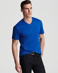 In cotton jersey, this essential Michael Kors tee shows off a v neck, short sleeves and straight hem. In cotton jersey, this essential Michael Kors tee shows off a v neck, short sleeves and straight hem.