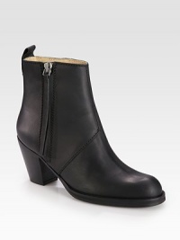 Buttery leather design with a side zipper detail and stylishly stacked heel. Stacked heel, 2¾ (70mm) Leather upper Leather lining and sole Padded insole Made in ItalyOUR FIT MODEL RECOMMENDS ordering true whole size; ½ sizes should order the next whole size up. Buttery leather design with a side zipper detail and stylishly stacked heel. Stacked heel, 2¾ (70mm) Leather upper Leather lining and sole Padded insole Made in ItalyOUR FIT MODEL RECOMMENDS ordering true whole size; ½ sizes should order the next whole size up.