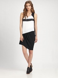 Supple leather insets elevate this artfully draped, two-tone silhouette.ScoopneckSleevelessLeather insetsAsymmetrical draped skirtBack keyhole with button closureFully linedAbout 26 from natural waistWhite layer: polyesterBlack layer: 60% triacetate/40% polyesterDry cleanMade in USA of imported fabricModel shown is 5'10 (177cm) wearing US size Small. Supple leather insets elevate this artfully draped, two-tone silhouette.ScoopneckSleevelessLeather insetsAsymmetrical draped skirtBack keyhole with button closureFully linedAbout 26 from natural waistWhite layer: polyesterBlack layer: 60% triacetate/40% polyesterDry cleanMade in USA of imported fabricModel shown is 5'10 (177cm) wearing US size Small.