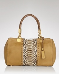 Practical style proves exotic with this leather satchel from Michael Kors. Whether as a weekend bag or on-duty carryall, this snake style hints at your wild side. Practical style proves exotic with this leather satchel from Michael Kors. Whether as a weekend bag or on-duty carryall, this snake style hints at your wild side.