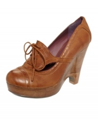 Dress up your casual outfits with this menswear-inspired style. Kensie's Feist oxford wedges feature a lace-up vamp with keyhole side cutouts. Dress up your casual outfits with this menswear-inspired style. Kensie's Feist oxford wedges feature a lace-up vamp with keyhole side cutouts.