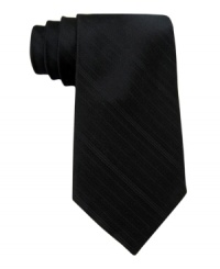Ground a patterned shirt. This solid tie from Calvin Klein is the perfect companion to the season's favorite look. Ground a patterned shirt. This solid tie from Calvin Klein is the perfect companion to the season's favorite look.