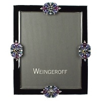 Created by hand in Weingeroff's 4th-generation workshop in Rhode Island, this frame presents a modern couture view of Hollywood glam. Recalling the look of amethysts, sapphires and diamonds, sparkling hand-set Swarovski crystals embellish hand-applied ebony lacquer.