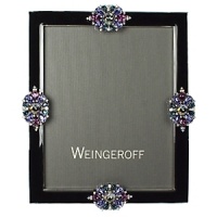 Created by hand in Weingeroff's 4th-generation workshop in Rhode Island, this frame presents a modern couture view of Hollywood glam. Recalling the look of amethysts, sapphires and diamonds, sparkling hand-set Swarovski crystals embellish hand-applied ebony lacquer. Created by hand in Weingeroff's 4th-generation workshop in Rhode Island, this frame presents a modern couture view of Hollywood glam. Recalling the look of amethysts, sapphires and diamonds, sparkling hand-set Swarovski crystals embellish hand-applied ebony lacquer.
